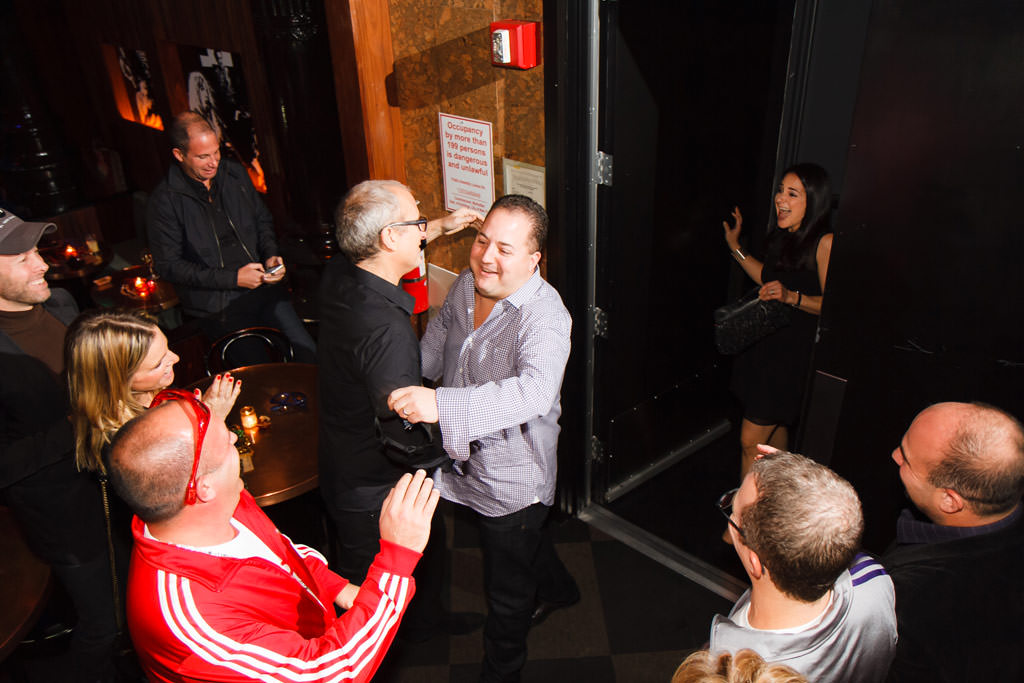 Photographs of Chef Josh Capon's surprise 40th birthday by top New York Photographer Michael Jurick